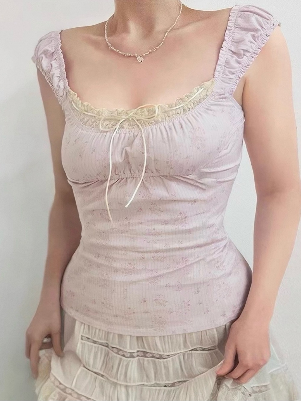 Pink floral feminine top with ivory lace detail and tie front